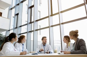 group-of-doctors-in-meeting-with-consultant-2022-03-04-01-46-14-utc-1